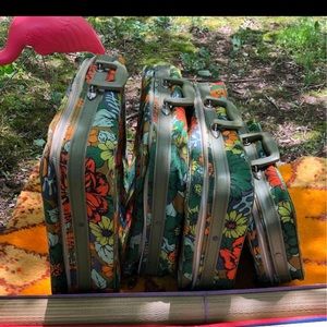 set of 4 vintage 70s suitcases